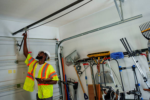 Professional Garage Door Panel Replacement technician working in Bellefonte, PA